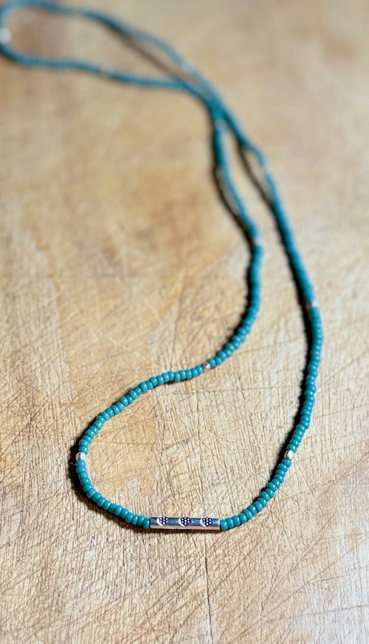 Eucalyptus Green Stretchy Seed Bead Necklace with Rounded Silver Floral Stamped Charm