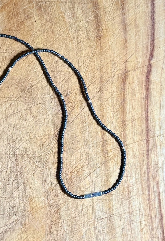Steel Grey Stretchy Seed Bead Necklace with Silver Squared Floral Stamped Charm
