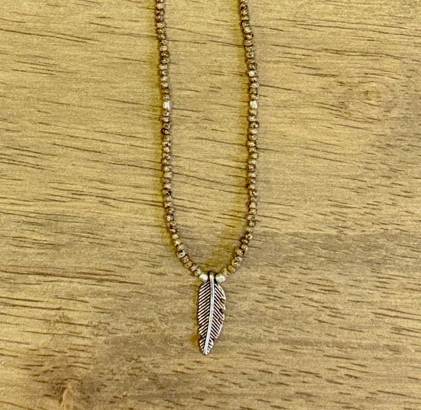 Speckled Beige Stretchy Seed Bead Necklace with Silver-Plated Feather Charm