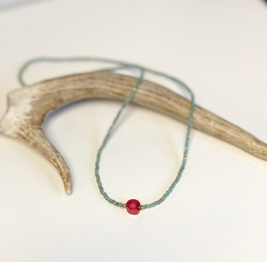 Stretchy Speckled Green Seed Bead Necklace with Vibrant Coral Gemstone Pendant