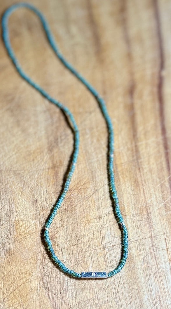 Speckled Green Stretchy Seed Bead Necklace with Silver Squared Floral Stamped Charm