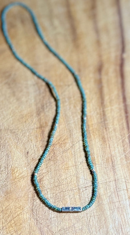 Speckled Green Stretchy Seed Bead Necklace with Silver Squared Floral Stamped Charm