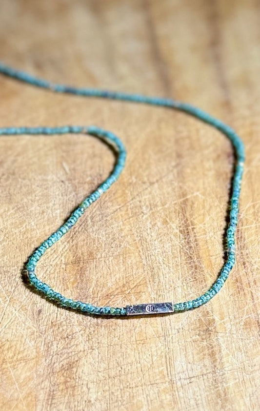 Speckled Green Stretchy Seed Bead Necklace with Silver Squared Floral Stamped Charm