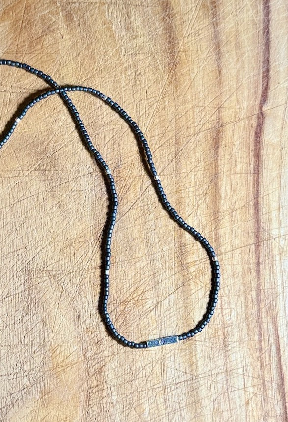 Steel Grey Stretchy Seed Bead Necklace with Silver Squared Floral Stamped Charm