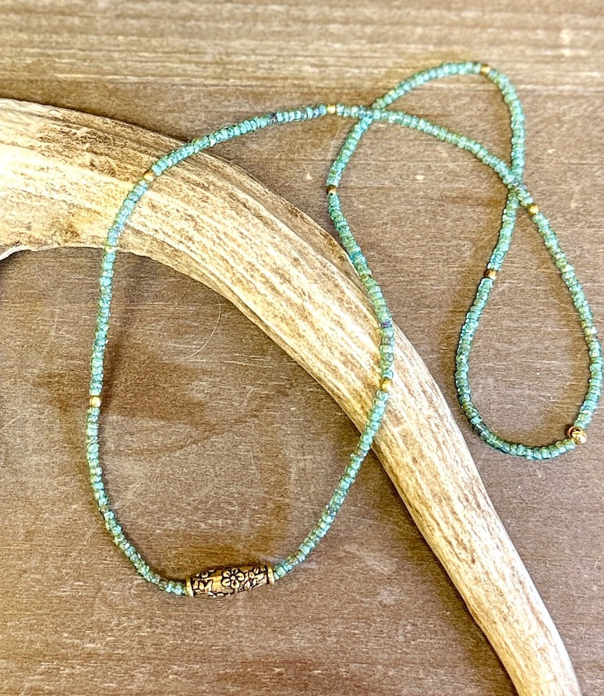 Speckled Green Stretchy Seed Bead Necklace with Gold-Plated Floral Barrel Bead Charm