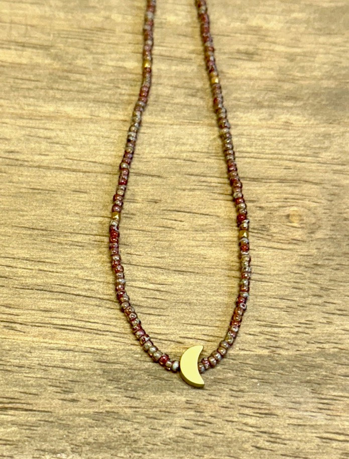 Speckled Burgundy Red Beige Stretchy Seed Bead Necklace with Gold Crescent Moon Charm