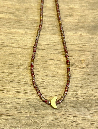 Speckled Burgundy Red Beige Stretchy Seed Bead Necklace with Gold Crescent Moon Charm