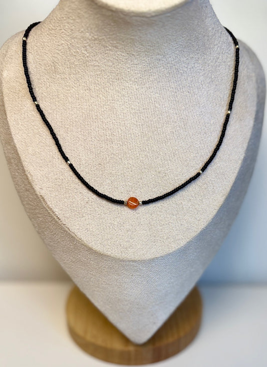 Stretchy Black Seed Bead Necklace with Small Carnelian Coin Gemstone Pendant