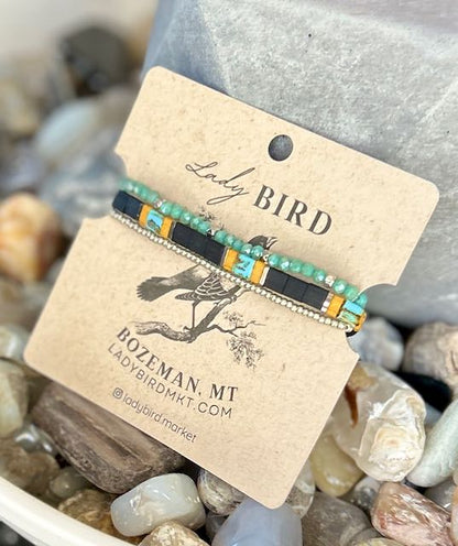 Jet Black & Sunflower Yellow Tila Bead Stacked Bracelet Set – Handmade Boho Stretch Bracelets with Silver or Gold Accents