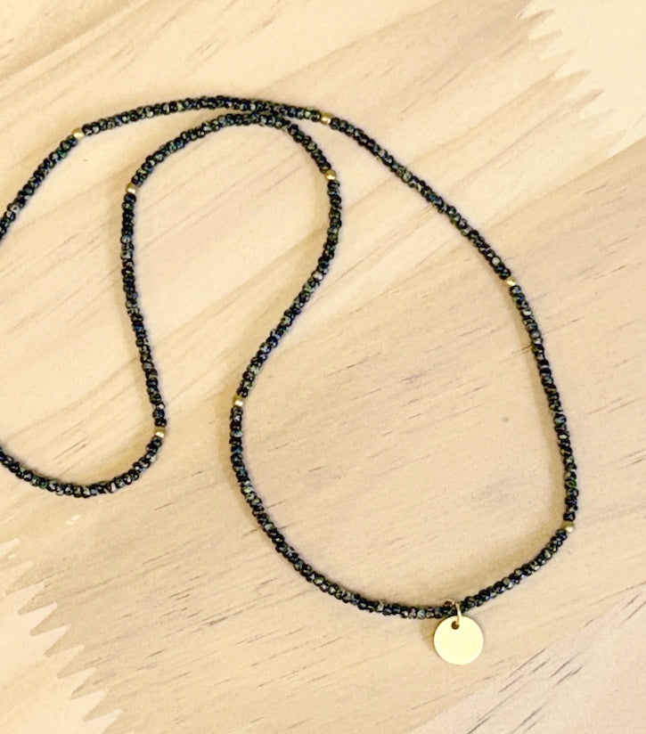 Speckled Black Stretchy Seed Bead Necklace with Brushed Gold Circle Charm