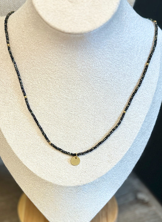 Speckled Black Stretchy Seed Bead Necklace with Brushed Gold Circle Charm