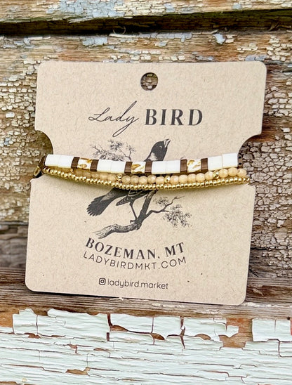 Creamy White Harvest & Bronzed Gold Tila Bead Stacked Bracelet Set