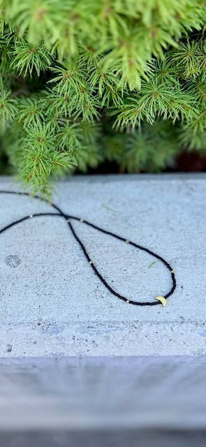 Black Stretchy Boho Seed Bead Necklace with Gold Crescent Moon Charm