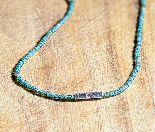 Speckled Green Stretchy Seed Bead Necklace with Silver Squared Floral Stamped Charm